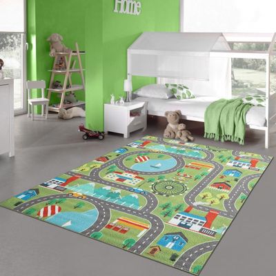 Kinder Spielteppich mit Stadtlandschaft auf Wiese in grün Größe - 80 x 150 cm