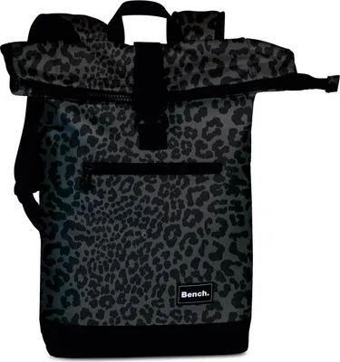 A roll-top backpack with a leopard print pattern.