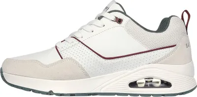 A side view of a white Skechers sneaker.
