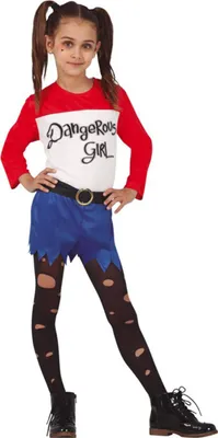 A young girl is posing in a costume.