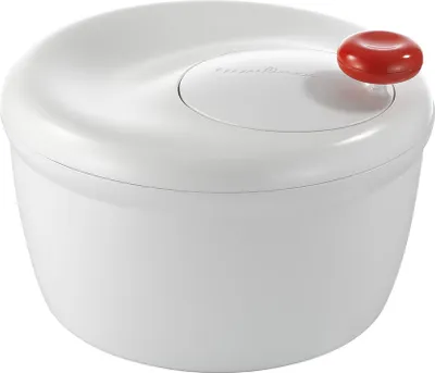 A white salad spinner with a red knob on top, set against a white background.