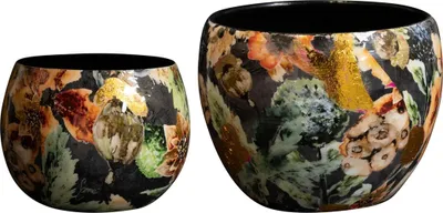 Two decorative bowls with a floral pattern and gold accents.