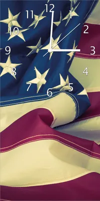 Produktbild von Wallario Design Wanduhr Amerikanische Flagge im Wind aus Echtglas, Größe 30 x 60 cm