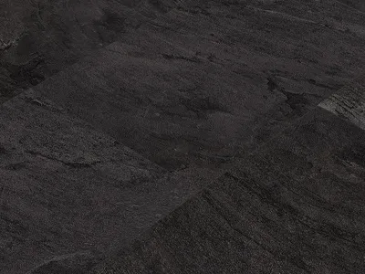 A close-up, angled view of dark gray slate tiles.