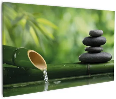 Produktbild von Wallario Premium Leinwandbild Steinstapel und Bambus auf dem Wasser in Größe 60 x 90 cm