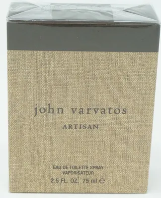 A close-up shot of the front of a John Varvatos Artisan Eau de Toilette spray bottle packaging.