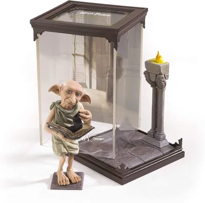 Imagen del producto de Figura Dobby con Diorama Magical Creatures Harry Potter Estatua 19 cms