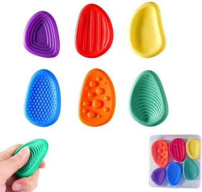 Immagine prodotto di Giocattoli antistress - Confezione da 6 pezzi - Giocattoli per alleviare lo stress - Oggetti sensoriali - Giocattoli per stimolazione sensoriale e motoria - Pietre sensoriali - Ideali come regalo. Adatti a bambini di entrambi i sessi. Utili per supportare persone con autismo/ADHD