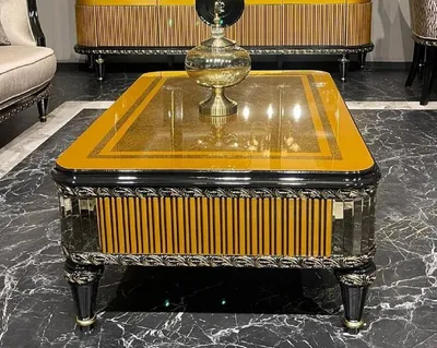 Produktbild von Casa Padrino Luxus Barock Couchtisch Gold / Schwarz / Gold - Prunkvoller Wohnzimmertisch im Barockstil - Barockstil Wohnzimmer Möbel - Barock Einrichtung - Barock Möbel - Luxus Möbel im Barockstil