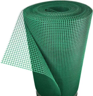 A roll of green plastic mesh fencing.