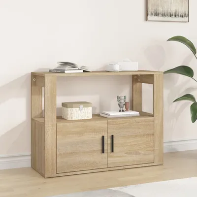A wooden sideboard with two doors and an open shelf above, placed against a light-colored wall.