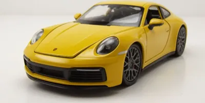 Produktbild von Welly 24099G Porsche 911 (992) Carrera 4S 2019 gelb 1:24