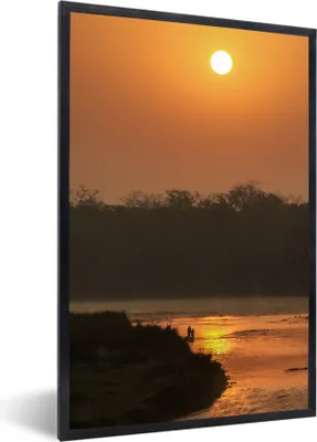 Produktbild von MuchoWow® MuchoWow® Gerahmtes Poster Oranger Sonnenuntergang im Chitwan-Nationalpark in Nepal 40x60 cm - Poster mit zchwarzem Bilderrahmen - Papierdruck - Wandbilder