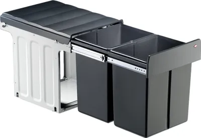 A pull-out kitchen waste bin system with two compartments.