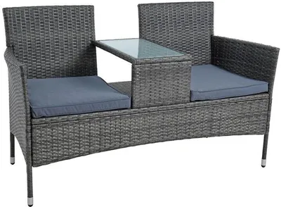 A polyrattan garden bench with a central table and cushions, shown against a white background.