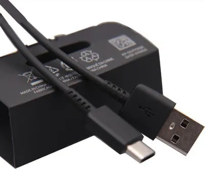 A black USB Type-C charging cable is shown lying on top of its black packaging box.