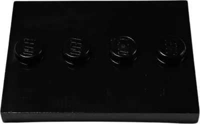 A black LEGO base plate with four studs is shown from a slightly elevated angle.
