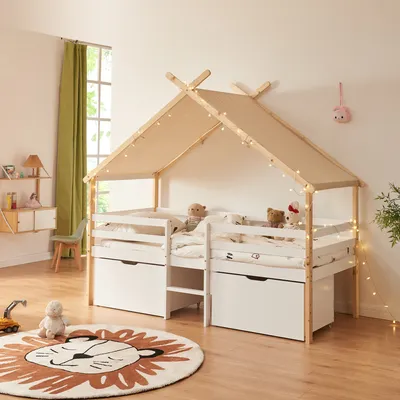 A child's bedroom with a house-shaped bed, toys, and decor.