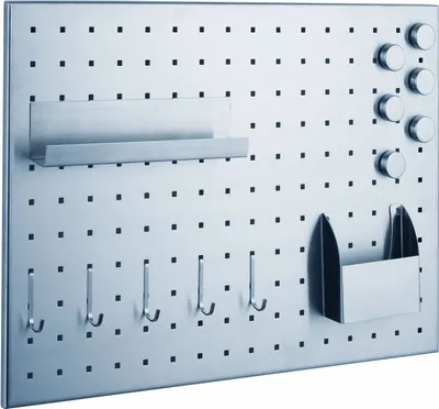 A pegboard with various accessories attached.