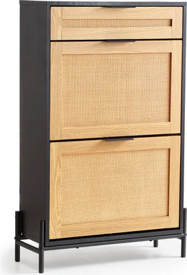 A shoe cabinet with rattan detailing and metal legs.