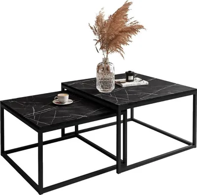 Two nesting coffee tables with a marble-like black and white pattern on a white background.