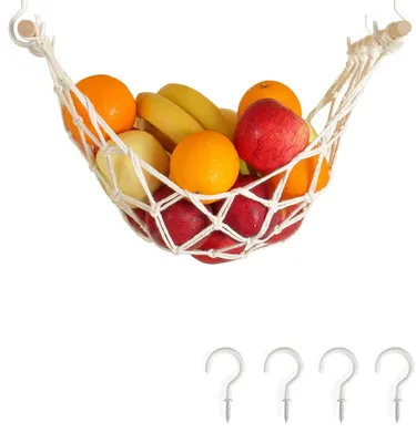 A fruit hammock filled with various fruits, suspended from hooks.