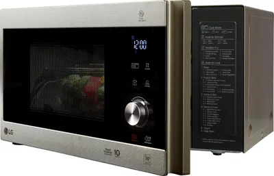 A silver LG microwave oven is shown from a three-quarter angle, with its door slightly ajar revealing food inside. The right side of the microwave shows a panel with text and diagrams.