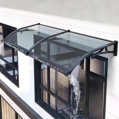 Immagine prodotto di Tettoia antipioggia in policarbonato - Protezione dalle intemperie - Ampia grondaia - 60x480 cm - Grigio scuro