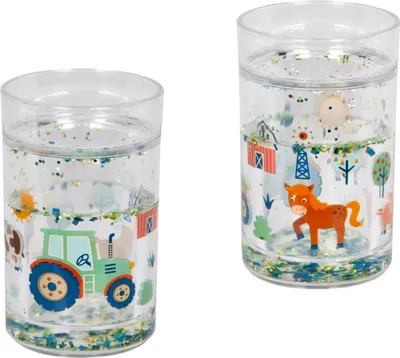 Produktbild von Die Spiegelburg Glitzerndes Trinkglas mit Traktormotiv, 11 cm hoch, Ø 6,5 cm, Kunststoff - 1 Becher