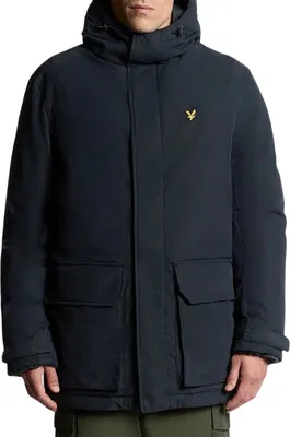 A man wearing a navy parka jacket.