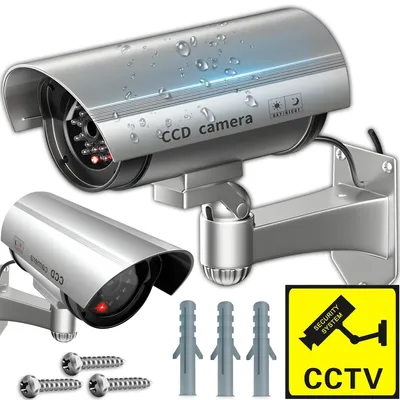 Produktbild von Kamera Attrappe Dummy Alarm mit LED Blinklicht Fake Überwachung Überwachungskamera Innen und Außen Alarmanlage Sicherheitskamera Silber Retoo