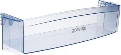 A transparent plastic shelf with the brand name 'Gorenje' visible.