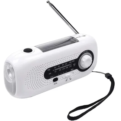 A white emergency radio with a solar panel and flashlight.