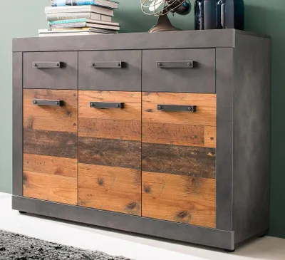 A modern dresser with a mix of gray metal and rustic wood finishes.
