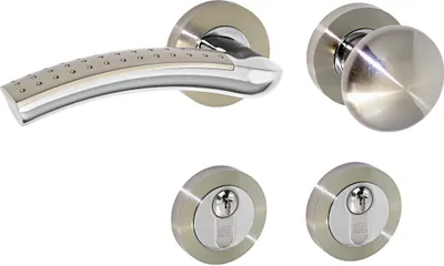A set of door hardware, including a lever handle, a round knob, and two keyhole escutcheons, arranged on a white background.