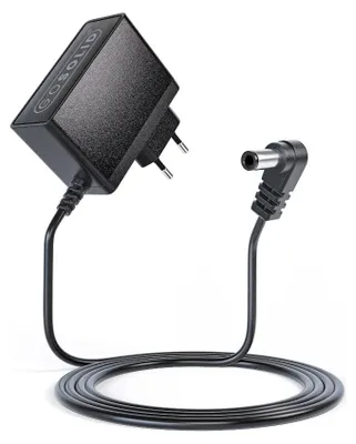 A black power adapter with a coiled cable and a circular connector.