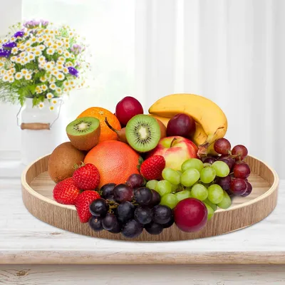 Immagine prodotto di Vassoio in legno dallo stile vintage, ecologico, ideale per servire tè, frutta e cibi in casa (30 cm)