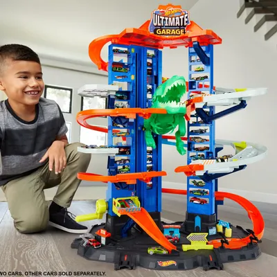 Produktbild von Hot Wheels Megacity Parkgarage T-Rex Angriff, Platz für über 100 Spielzeugautos