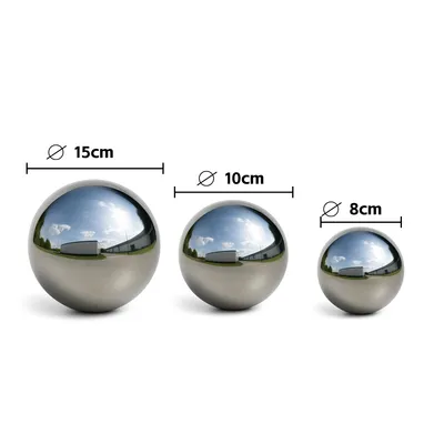 Three polished stainless steel garden spheres of different sizes are displayed on a white background, with size indicators above each sphere.
