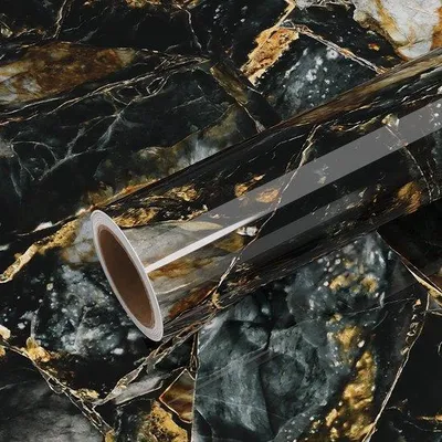 Produktbild von Unyqoos® selbstklebende Marmor-Tapete in Schwarz und Gold für Küche und Bad