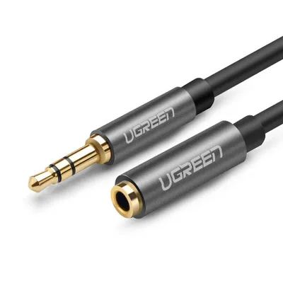 A close-up shot of a Ugreen AUX extension cable with 3.5mm jack connectors.