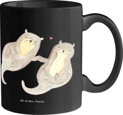 Produktbild von Mr. & Mrs. Panda Tasse Otter Hände halten - Schwarz - Geschenk, haferl, Verliebt, Geschenktasse, Kaffeepott, Kaffeebecher, Liebe, keramik, Paar, glücklich, Seeotter