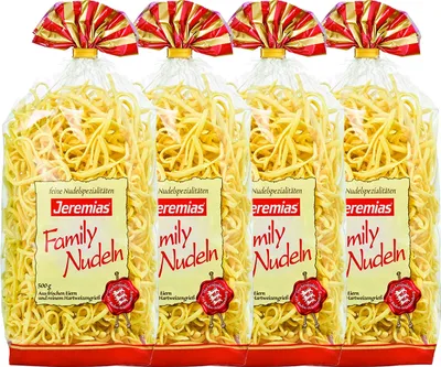 Four bags of pasta are shown side-by-side against a white background.