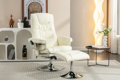 A beige recliner chair with a matching ottoman is shown in a well-lit room with a white shelving unit and a small side table.