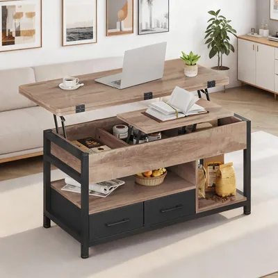 A lift-top coffee table in a living room setting, with a laptop and coffee cup on top.
