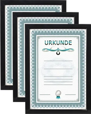 Three framed certificates are arranged in a staggered formation, with the frontmost certificate clearly displaying the word 'URKUNDE'.