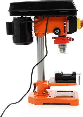 A close-up studio shot of a drill press on a white background.