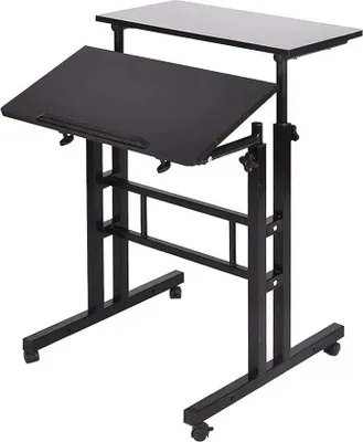 Immagine prodotto di Scrivania in piedi - Tavolo su ruote regolabile in altezza - Piano inclinabile - Altezza 70–110 cm - Ruote con freno - Struttura in metallo, piano in legno - Nero