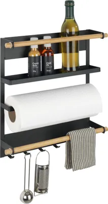 A magnetic kitchen shelf with various kitchen items attached.
