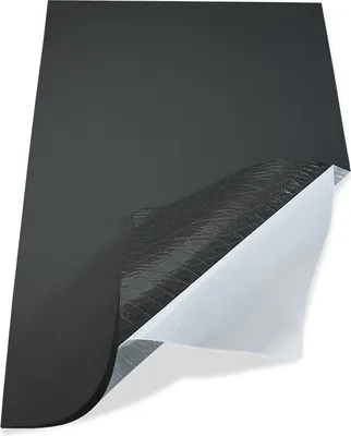A sheet of black insulation material is shown with a corner peeled back to reveal a silver and white layered interior.